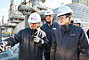 Industry Minister Kim Jung-kwan listens to on-site officials with LG Chem CEO Shin Hak-cheol during a visit to an LG Chem facility at the Yeosu Industrial Complex in Yeosu, South Jeolla, on Nov. 26. [MINISTRY OF TRADE, INDUSTRY AND RESOURCES]