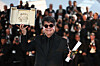 Director Jafar Panahi, Palme d'Or award winner for the film ″Un simple accident″ poses during a photocall after the closing ceremony of the 78th Cannes Film Festival in Cannes, France on May 24. [REUTERS/YONHAP]