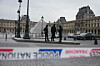 French police officers patrol in front of the Louvre Museum after it was robbed, with the Louvre Pyramid designed by Ieoh Ming Pei in the background, in Paris on Oct. 19. [AFP/YONHAP]