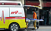 A first responder stands by an ambulance parked at the entrance of an emergency room of a university hospital in Daejeon on April 17. [JOONGANG ILBO]