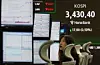 A screen in Hana Bank's trading room in central Seoul shows the Kospi opening on Sept. 18. [YONHAP]