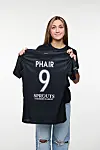 Casey Phair poses with her Angel City FC shirt in a photo released by the club Thursday. [ANGEL CITY]