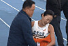 Runner Lee Su-min of the Samcheok City Hall track and field team, the women’s domestic winner of the 2025 Incheon International Marathon, pushes past her coach, Kim Wan-gi, after crossing the finish line on Nov. 23 as seen in this video uploaded to YouTube. [SCREEN CAPTURE]