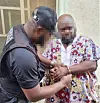 K Jeff, a drug ring leader in Nigeria, is arrested in a photo provided by Korea's National Intelligence Service on Feb. 20. [YONHAP]