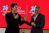 Actors Park Bo-gum, left, and George Clooney attend the Omega House that opened as part of the luxury watchmaker's event to mark the Milan-Cortina Winter Olympics on Feb. 7. [SCREEN CAPTURE]