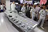 Visitors to a shipping industry fair held in Busan look at the model of the model of the Korean Destroyer Next Generation (KDDX) made by HD Hyundai Heavy Industries on June 7, 2023. [JOONGANG ILBO]