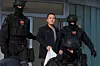 Montenegrin police officers escort Korean citizen, Terraform Labs founder Do Kwon in Montenegro's capital Podgorica, March 23, 2024. [AP/YONHAP]