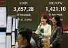 A financial data screen in the dealing room of Hana Bank in Seoul shows the benchmark Kospi having jumped 95.47 points, or 2.68 percent, to close at a fresh all-time high of 3,657.28 on Oct. 15. [YONHAP]