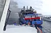 In this photo made from video released by the Indonesian National Search and Rescue Agency (Basarnas), rescue ship approach passenger ship KM Barcelona after it caught fire in the waters off Talise Island in North Sulawesi, Indonesia, on July 20. [AP/YONHAP]
