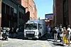 Members of the public and photographers look on as a prison van leaves from the back of the courts shortly after U.S. rapper Chris Brown has attended a hearing inside Manchester Magistrates' Court in north-west England on May 16. [AFP/YONHP]