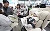 Visitors examine childcare products at the 42nd Daegu Baby & Kids Fair at Exco in Buk District, Daegu, on Nov. 7, 2024. [YONHAP]
