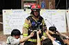 A firefighter briefs reporters about the subway arson that took place in western Seoul on the morning of May 31. [YONHAP]