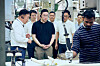 LG Group Chairman Koo Kwang-mo, second from left in the front row, visits LG Electronics' Noida manufacturing plant in New Delhi, India, to observe the air conditioner production process in this photo provided on March 4. [LG]
