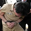 Jeong Seong-hyeon, who was sentenced to death for killing two elementary school students and dismembering their bodies, heads to court in 2008. [YONHAP]