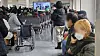 Patients and their guardians sit and wait for their turn at a hospital in Seoul on Wednesday morning. [YONHAP]