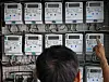 A citizen looks at electricity meters in a multiunit building Jongno District, central Seoul, on Sept. 22, 2024. [NEWS1]