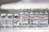 Vials of coronavirus disease (Covid-19) vaccines of Pfizer-BioNTech and Moderna are seen during a trial run of a mass vaccination center located inside of a gym in the town of Ricany near Prague, Czech Republic, February 25, 2021. [REUTERS/YONHAP]