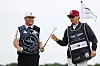 Im Sung-jae passes his putter to his caddie, William Wilcox, on the eighth green during day four of the Genesis Scottish Open at The Renaissance Club in North Berwick, Scotland on Sunday. [GETTY IMAGES]
