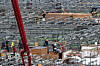 Worker dies after being hit by excavator at construction site