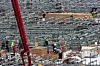 Worker dies after being hit by excavator at construction site