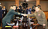 Maj. Gen. Kim Do-gyun, left, head of the South Korean delegation, poses for a photo with Lt. Gen. An Ik-san, chief of the North Korean delegation, before their general-grade talks at Tongilgak, a North Korean building in the truce village of Panmunjom inside the demilitarized zone, on Oct. 26, 2018. [JOINT PRESS CORPS]