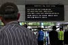 A notice informing passengers of suspended and delayed train services is displayed on an electronic signboard at Daejeon Station in Jung District, Daejeon, as heavy rain battered central regions on July 17. [YONHAP]