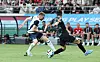 Tottenham Hotspur forward Dejan Kulusevski, left, in action against Bayern Munich defender Kim Min-jae during a Coupang Play Series match at Seoul World Cup Stadium in western Seoul on Saturday. [NEWS1]