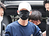 A man surnamed Won, in his 60s, accused of setting fire to a moving subway train on Seoul Metro Line No. 5, appears at the Seoul Southern District Court in Yangcheon District, western Seoul, on June 2 for a pretrial detention hearing. [NEWS1]