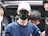 A man surnamed Won, in his 60s, accused of setting fire to a moving subway train on Seoul Metro Line No. 5, appears at the Seoul Southern District Court in Yangcheon District, western Seoul, on June 2 for a pretrial detention hearing. [NEWS1]