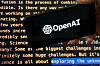 The OpenAI logo appears on a mobile phone in front of a screen showing part of the company website in this photo taken on Nov. 21, 2023 in New York. [AP/YONHAP]