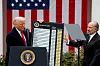 U.S. President Donald Trump holds a chart next to U.S. Secretary of Commerce Howard Lutnick as Trump delivers remarks on tariffs in the Rose Garden at the White House in Washington on April 2. [REUTERS/YONHAP]