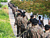 Army conscripts march at the Korea Army Training Center in Nonsan, South Chungcheong, on May 29, 2025. [YONHAP]
