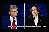 A monitor shows former President Donald Trump, left, and U.S. Vice President Kamala Harris during a presidential debate in Philadelphia, Pennsylvania, on Tuesday. [XINHUA/YONHAP]