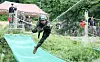 Soldiers from the 35th Infantry Division take part in a rope crossing exercise during guerrilla training at a training site in Imsil County, North Jeolla on July 3. [NEWS1]