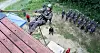 Soldiers from the 35th Infantry Division take part in a rope crossing exercise during guerrilla training at a training site in Imsil County, North Jeolla on July 3. [NEWS1]
