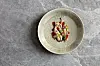 Saltwater poached guineafowl, Tasmanian abalone and water chestnut topped with white eggplant cream and black garlic vinegar at Akuna [AKUNA]