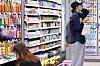 Customers look at goods at a convenience store in Seoul on May 12. [YONHAP]