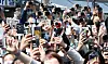 Fans of boy band Seventeen take photos of member Mingyu at a Snickers pop-up event in Seongdong District, eastern Seoul, on May 2. [NEWS1]