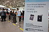 A notice explaining new procedures for carrying portable batteries on board is displayed in front of the check-in counters at Gimhae International Airport in Gangseo, Busan, on Sept. 1. [YONHAP]