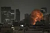 An explosion is seen during a missile attack in Tel Aviv, Israel, Sunday, June 15, 2025. [AP/YONHAP]