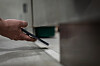 Stock photo of a person filming at a bathroom unrelated to the story [GETTY IMAGES BANK]