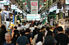 A banner promoting the use of consumer coupons hangs at Mangwon Market in Mapo District, Seoul, on Aug. 26. [YONHAP]