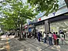 People line up outside an SK Telecom store in Mapo District, western Seoul, on April 28. [JOONGANG ILBO]