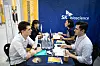 Participants sit in a job interview during the Job Fair for International Students held in August last year. [NEWS1]