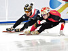 Park Ji-won, left, competes in the men's 5000-meter relay final at the International Skating Union (ISU) Short Track World Tour in Beijing, China on Sunday. The men's team secured a silver medal in the race, ending the tour in Beijing with a gold, three silver and two bronze medals for Korea. Park won a gold in the men's 1500-meter, the men's, women's and mixed teams all won silvers in the relays, and Choi Min-jeong and Kim Gil-li took bronze in the women's 1000-meter and 1500-meter, respectively. [XINHUA/YONHAP]