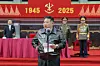 Kim Jong-un congratulates and encourages participants and organizers of the 80th anniversary celebrations of the party’s founding and watches a mass gymnastics performance and art show with them on Oct. 12. [RODONG SINMUN]