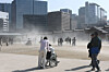 Strong winds sweep up sand from the grounds at Gyeongbok Palace in central Seoul on Feb. 21. [YONHAP]