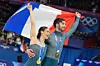Gold medalists Laurence Fournier Beaudry and Guillaume Cizeron of France after beating Madison Chock and Evan Batesthe of the United States in the ice dancing free skate in figure skating at the 2026 Winter Olympics in Milan on Feb. 11. [AP/YONHAP]