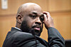 Cleophus Cooksey Jr., accused of killing eight people over a three-week span in late 2017, listens during his trial in Maricopa County Superior Court, May 5, in Phoenix, Ariz. [AP/YONHAP]