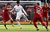 Tottenham Hotspur's Son Heung-min, second from left, vies with Liverpool's Wataru Endo and Alexis MacAllister during the match at Anfield in Liverpool, England on Sunday. [AP/YONHAP]